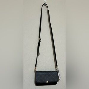 Nine West Black Purse. Please see picture 5 to see a little piece off of purse.